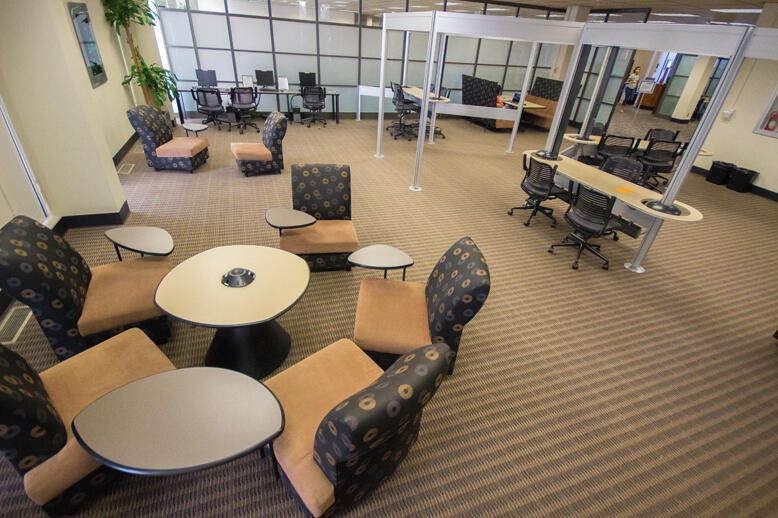 Tables and chairs in the Exchange at Norris Medical Library